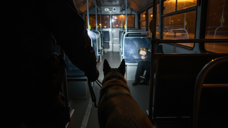 The dashcam footage still haunts me. We thought the bus was empty until Radar started barking at the back seat. What we found wasn’t a package—it was a freezing 6-year-old boy, shattered by a world that forgot him.