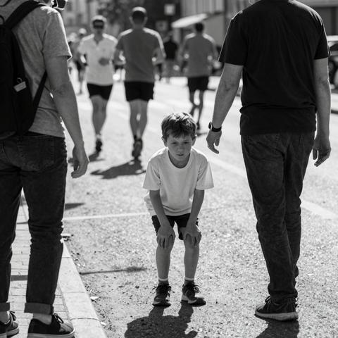 My Six-Year-Old Son Begged Me To Stop During The 95°F Fun Run, But I Kept Pushing Him Toward The Finish Line. When He Crossed It In Silence, I Realized Winning Had Cost Me My Child’s Trust.